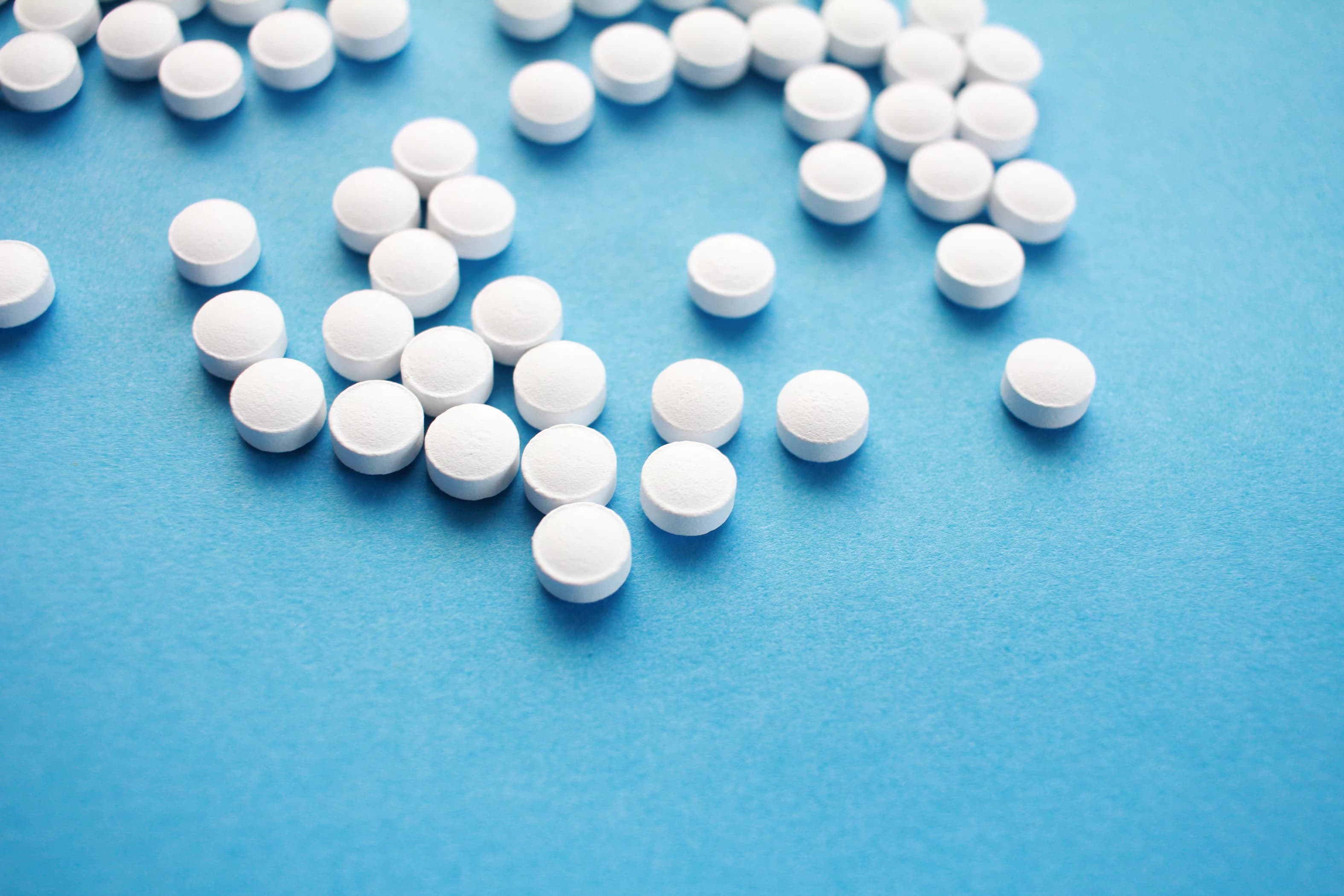 Blue bg white pills